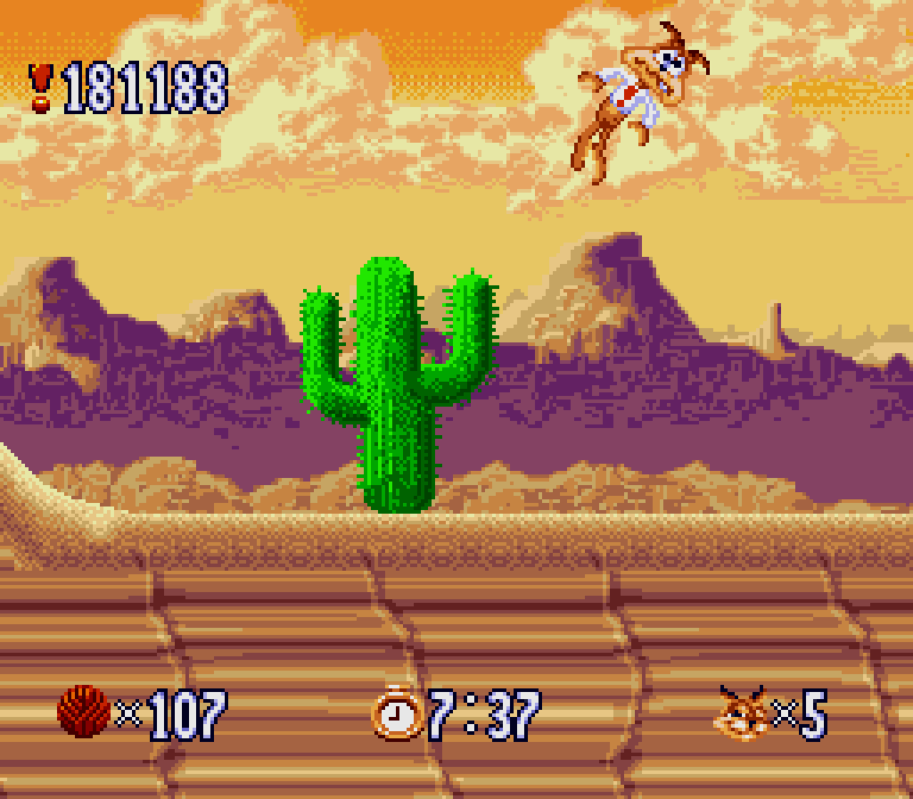 Bubsy flies away after touching a cactus in the game Bubsy in Claws Encounters of the furred kind