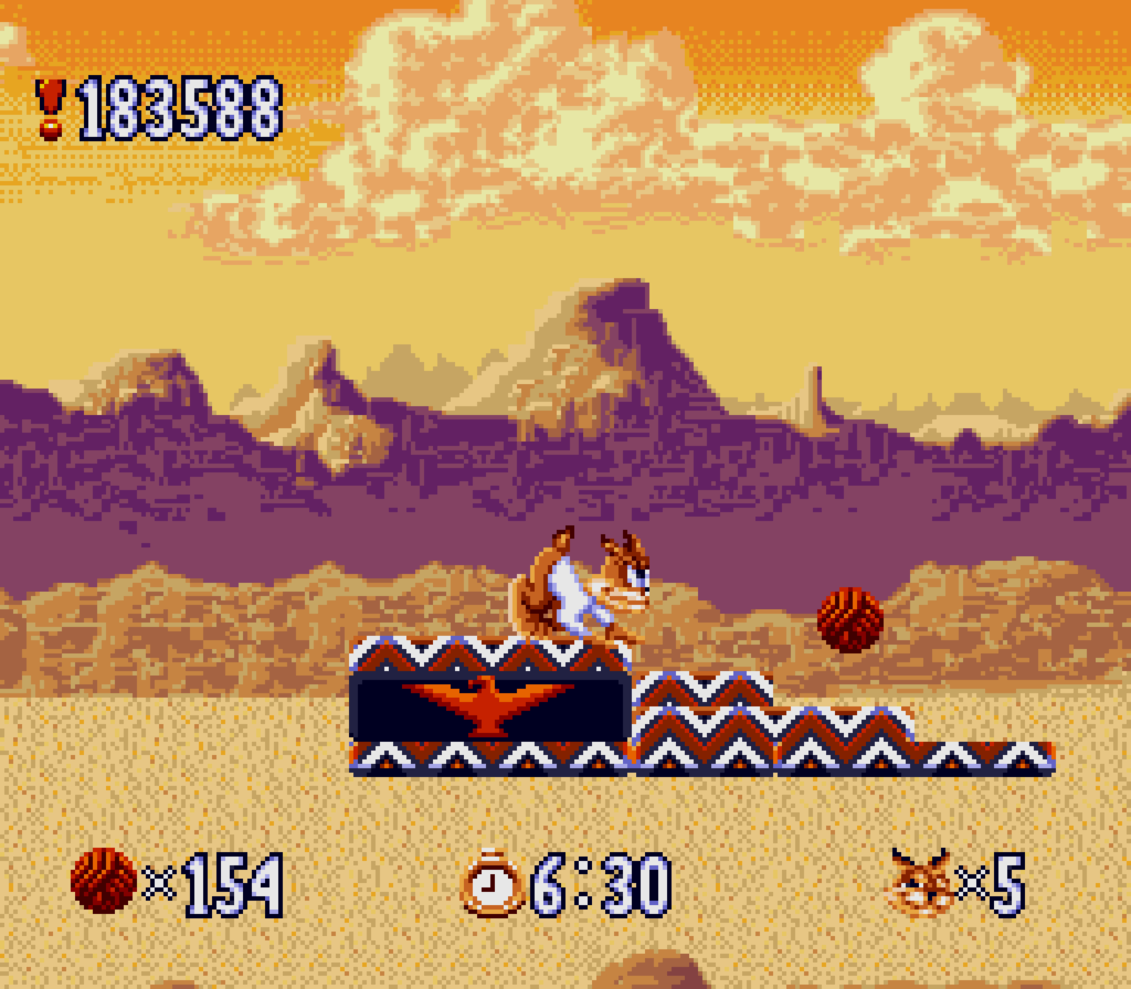 Bubsy stands on a questionable eagle symbol in the game Bubsy in Claws Encounters of the furred kind
