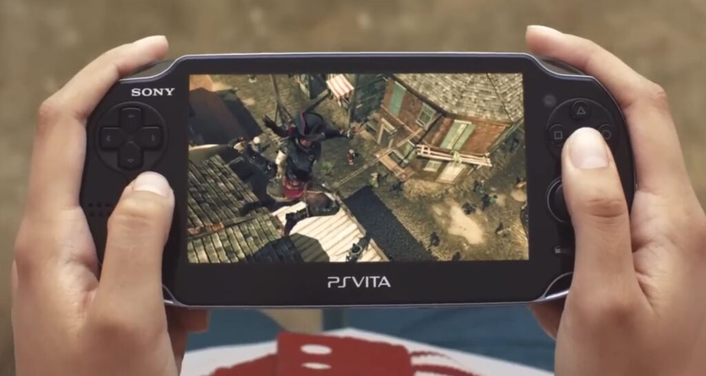 PS Vita in hands of a person playing an action game from PS commercial