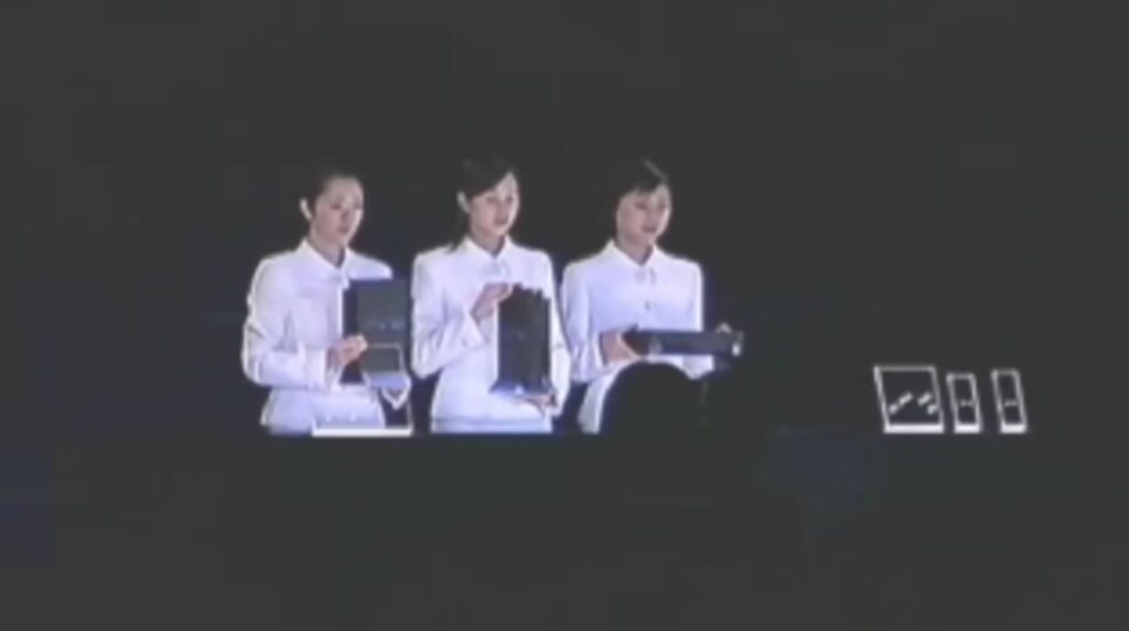 3 Japanese girls with 3 PS2 present it to the public